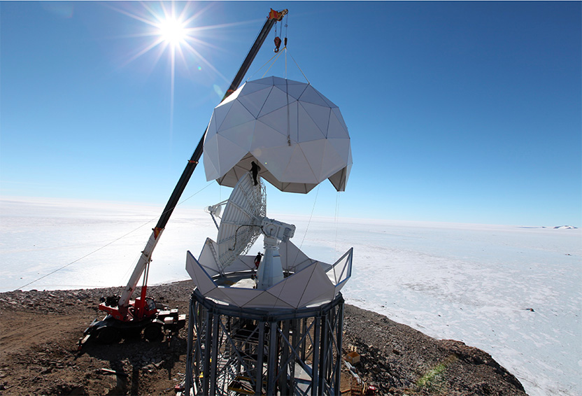 ESSCO radome being installed around an antenna at McMurdo Station in Antartica